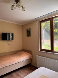 Postelja oz. postelje v sobi nastanitve Hotel forest echo