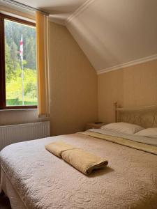 Postelja oz. postelje v sobi nastanitve Hotel forest echo