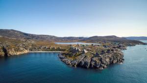 an aerial view of an island in the water at Ilimanaq Lodge - World of Greenland - 1 hour boat trip from Ilulissat in Ilmanaq