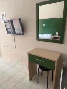 Μια τηλεόραση ή/και κέντρο ψυχαγωγίας στο Alexandra Sunshine Apartments
