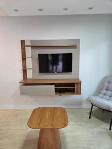 TV a/nebo společenská místnost v ubytování Residencial Amora