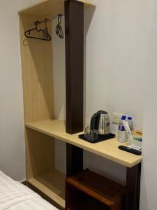 Winn's Hotel Bentong客房内的一张或多张床位