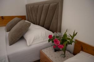 apartmani DENI客房内的一张或多张床位