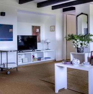 Et tv og/eller underholdning på Wohnung im Grünen cottage33