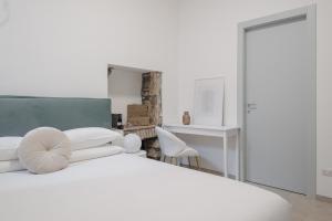 Postel nebo postele na pokoji v ubytování Basco Guest House