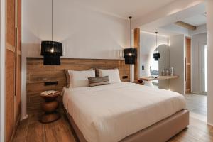 Postel nebo postele na pokoji v ubytování Almiriki Naxos Beachside Living