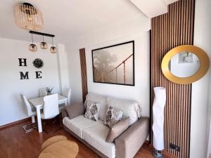 A seating area at Apartamento Primera Línea de Playa Paseo Marítimo Perla 5