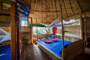Postel nebo postele na pokoji v ubytování Kactus-Your Island Sanctuary On Koh Ta Kiev