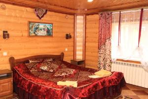 Postel nebo postele na pokoji v ubytování Ластівчине гніздо