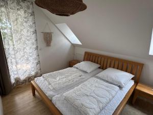 Ένα ή περισσότερα κρεβάτια σε δωμάτιο στο Ferienwohnung Hochhinaus