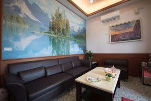 Posezení v ubytování Sweetfishs Homestay