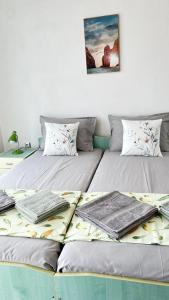 A bed or beds in a room at Guest House Pomorie