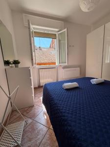 Posteľ alebo postele v izbe v ubytovaní Bologna Apartment
