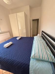 Posteľ alebo postele v izbe v ubytovaní Bologna Apartment