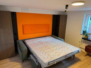 Кровать или кровати в номере Smarte Wohnung am Bahnhof