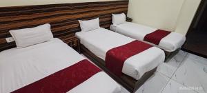 Postel nebo postele na pokoji v ubytování HOTEL SUN STAR INTERNATIONAL Pvt Ltd