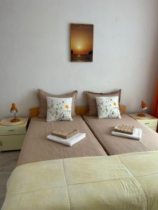 A bed or beds in a room at Guest House Pomorie