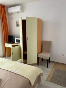 A bed or beds in a room at Guest House Pomorie