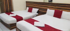 Postel nebo postele na pokoji v ubytování HOTEL SUN STAR INTERNATIONAL Pvt Ltd