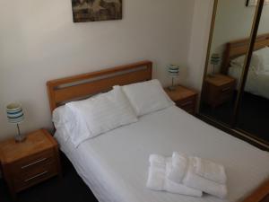 Ένα ή περισσότερα κρεβάτια σε δωμάτιο στο Aberdeen Serviced Apartments - Bloomfield
