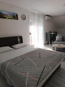 Ένα ή περισσότερα κρεβάτια σε δωμάτιο στο Sunce Bikavac