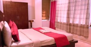 Voodi või voodid majutusasutuse Hotel Hight le mount toas