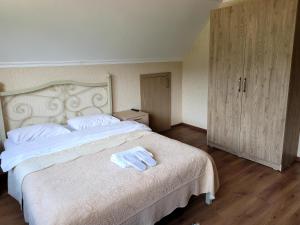 Postelja oz. postelje v sobi nastanitve Hotel forest echo