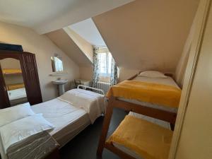 Postel nebo postele na pokoji v ubytování Villa Sainte-Odile