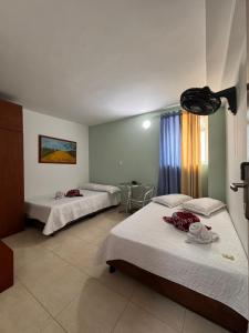 Postel nebo postele na pokoji v ubytování Hotel Estambul