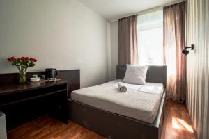 Cama ou camas em um quarto em Villa ENTO HotelWestEnd