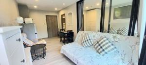 a living room with a couch and a table at B8 Ватсап669З5В2I976 in Nai Yang Beach