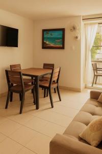 Et tv og/eller underholdning på Apto Remodelado a 1 cuadra playas Rodadero + 10 billeder