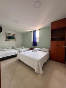 Postel nebo postele na pokoji v ubytování Hotel Estambul