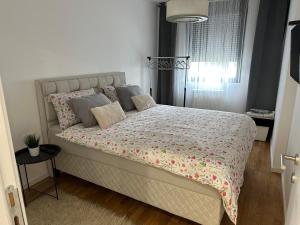 Postel nebo postele na pokoji v ubytování Apartman S