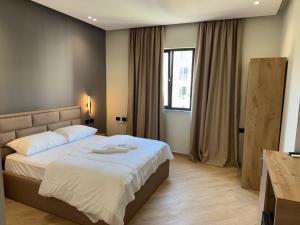 Postel nebo postele na pokoji v ubytování Hotel Tuyo