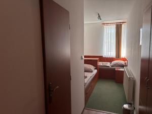 Postel nebo postele na pokoji v ubytování Ubytování Jívka 86