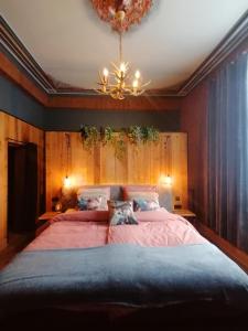 Postel nebo postele na pokoji v ubytování B&B La Sucrerie