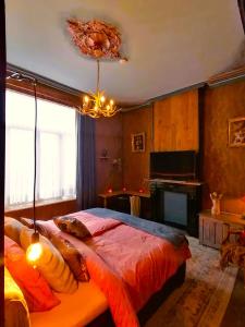 Postel nebo postele na pokoji v ubytování B&B La Sucrerie
