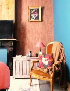 TV a/nebo společenská místnost v ubytování B&B La Sucrerie
