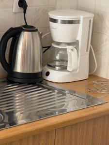 Coffee and tea making facilities at NEW PANORAMA STUDIOS ELECTRIC car ΦΟΡΤΙΣΗΣ ΣΤΑΤΙΟΝ
