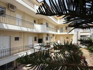 A balcony or terrace at NEW PANORAMA STUDIOS ELECTRIC car ΦΟΡΤΙΣΗΣ ΣΤΑΤΙΟΝ