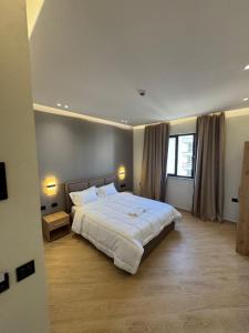 Postel nebo postele na pokoji v ubytování Hotel Tuyo