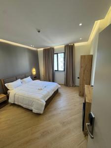 Postel nebo postele na pokoji v ubytování Hotel Tuyo