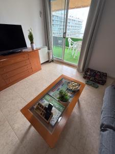 TV a/nebo společenská místnost v ubytování Apartalux Magic Paradise