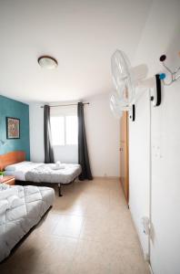 Postel nebo postele na pokoji v ubytování Apartalux Magic Paradise