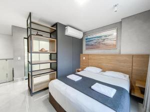 Ένα ή περισσότερα κρεβάτια σε δωμάτιο στο Luxury Collection Jacuzzi e Sala de Cinema