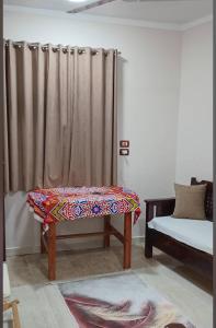 Postel nebo postele na pokoji v ubytování Maat Studio + 9 fotografií