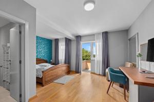 Postel nebo postele na pokoji v ubytování Minerva Hotel