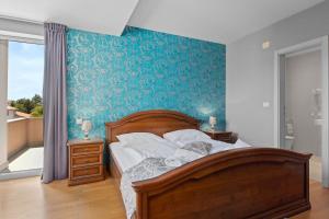 Postel nebo postele na pokoji v ubytování Minerva Hotel