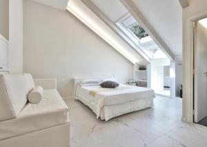 Ένα ή περισσότερα κρεβάτια σε δωμάτιο στο Villa Lara Hotel